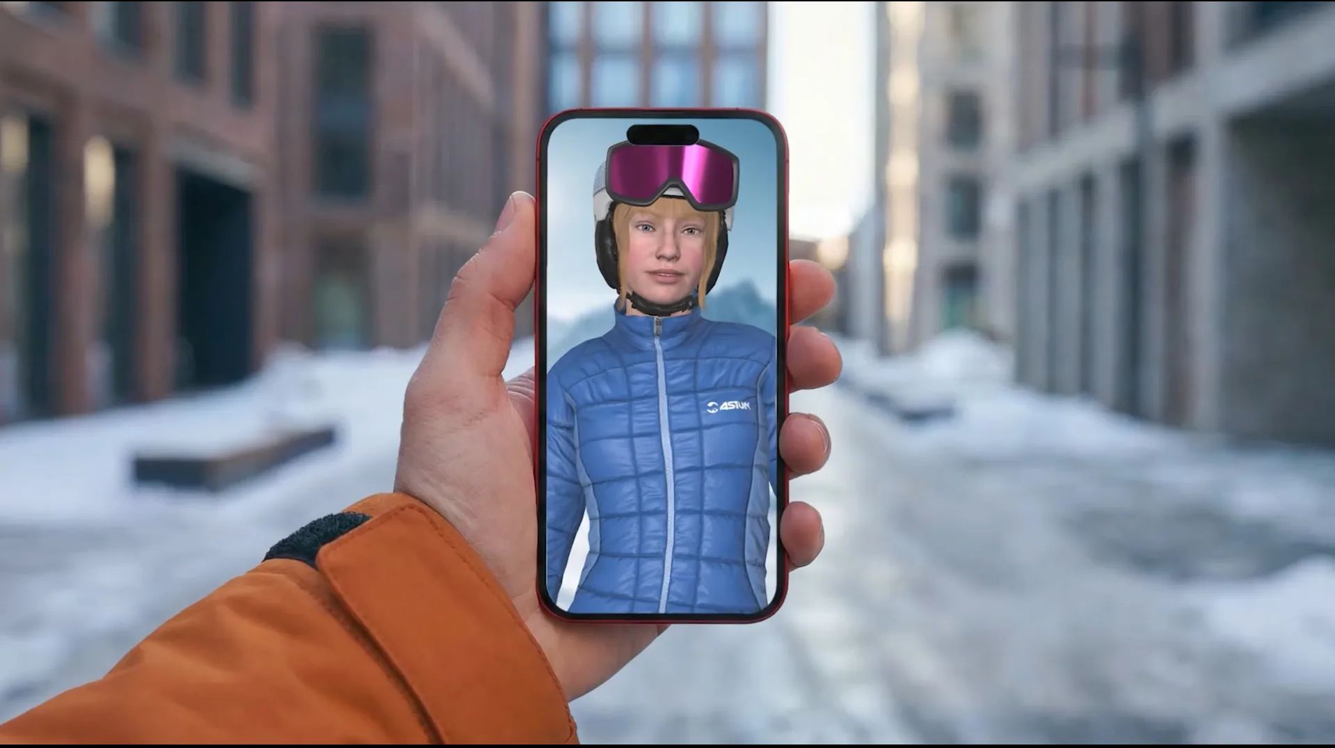 Visitante consultando al avatar guía con IA de Astún en la pantalla de su móvil en una calle nevada